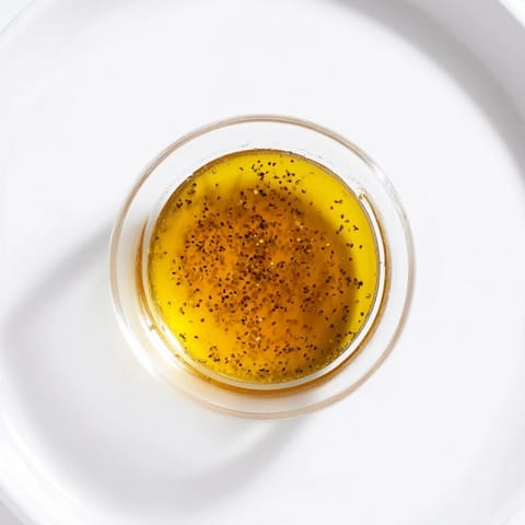 Emulsified Simple Honey Vinaigrette Salad Dressing, perfect for drizzling and enhancing salad flavors.