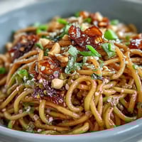 Spicy Chili Crisp Noodles, a vibrant, savory dish ready in minutes.